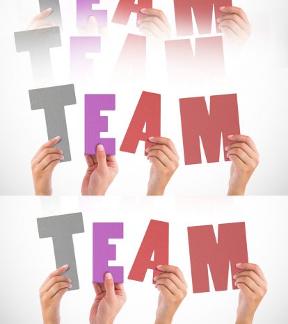 Hands holding team letter with white background